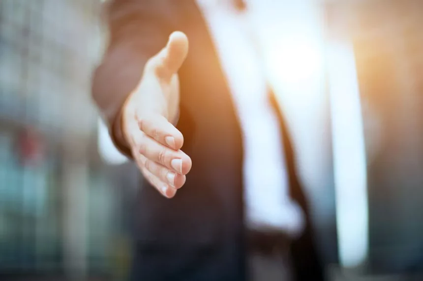 A Business Man offering a Handshake