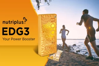 A young couple running on the beach with Nutrplus EDG3 in the frame