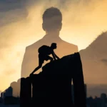 A man climbing a mountain