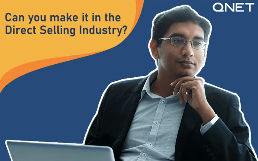 Featured Image A middle aged entrepreneur sitting in front of a laptop thinking about the direct selling industry.