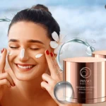 A woman using Physio Radiance Day & Night Cream