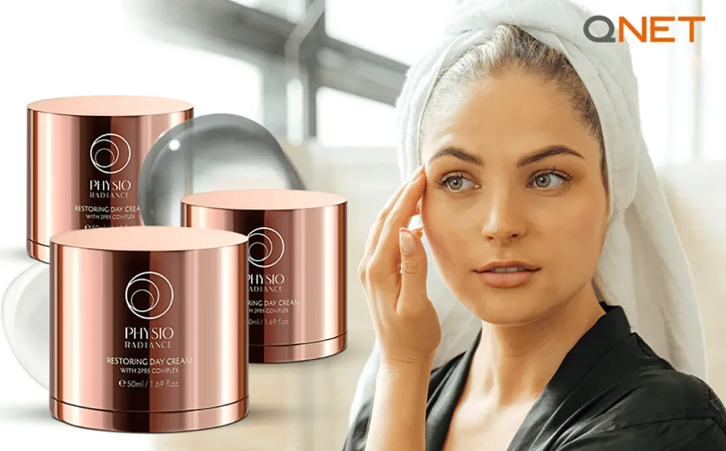 A woman using Physio Radiance Restoring Day Cream outdoors