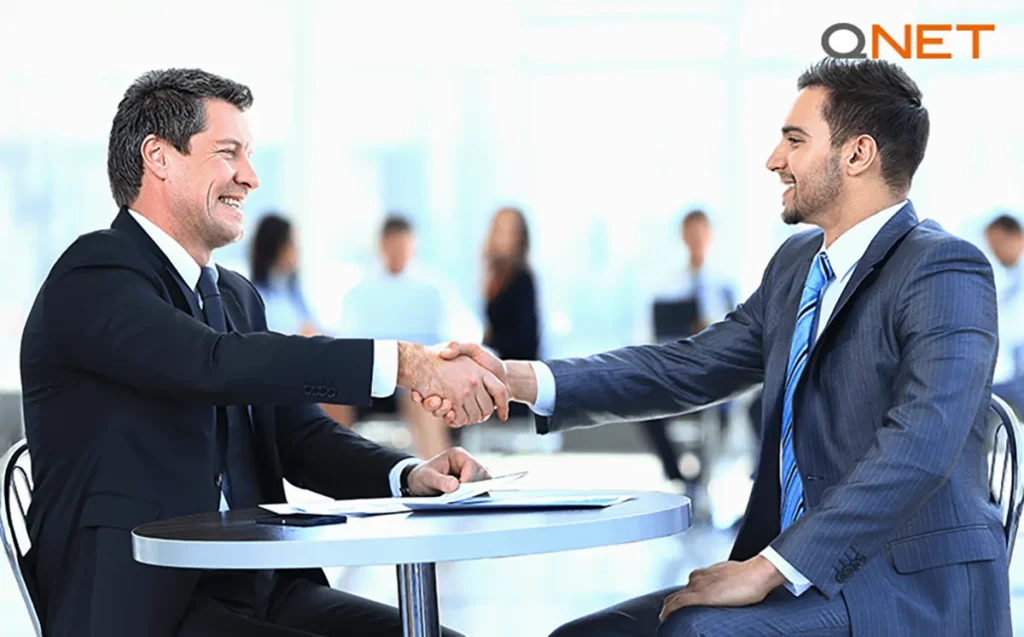Two businessmen shaking hands