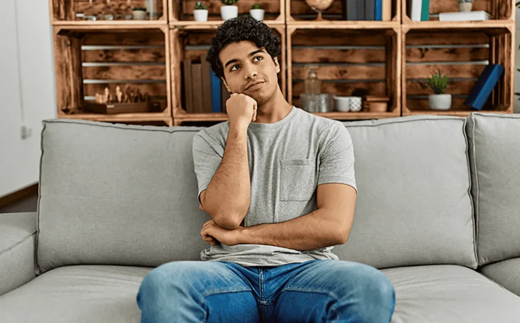 A young man wondering how to choose a good room air purifier