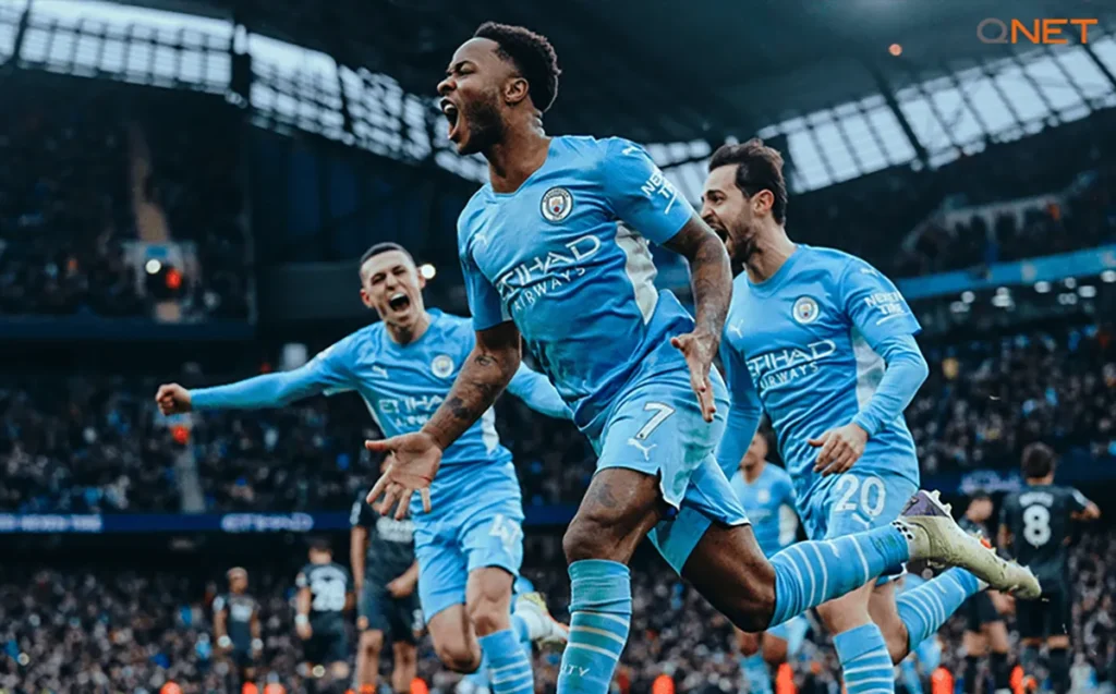 Raheem Sterling, Bernardo Silva and Phil Foden celebrate a team goal