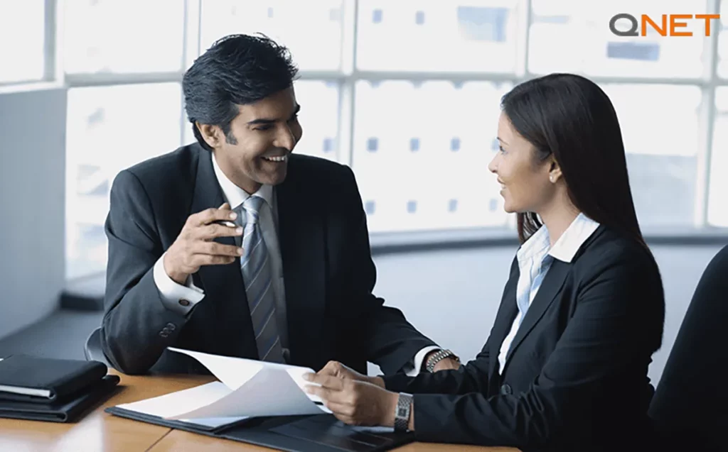 Direct sellers discussing about professional ethics in business during a meeting